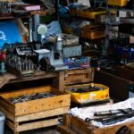 A detailed view of a workshop showcasing a variety of tools and equipment for crafting and repairs.