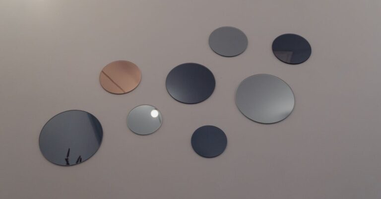 Aesthetic wall decoration featuring various round mirrors for modern interior design.